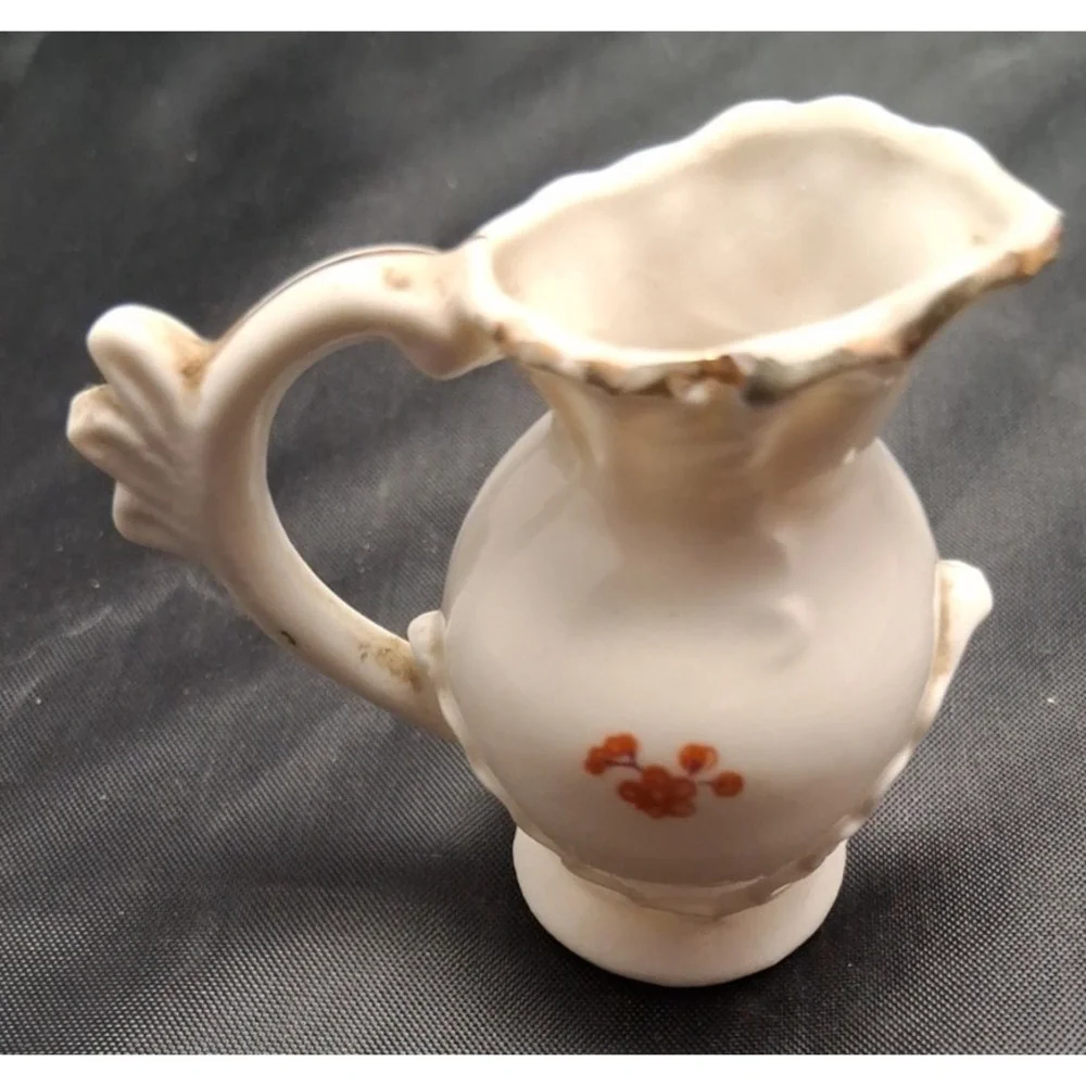 Collection of Seven Vintage Miniature Ceramic Bud Vases with Hand-Painted Design